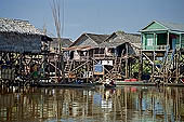 Tonle Sap - Kampong Phluk floating village - stilted houses 